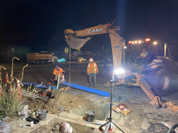 Contractor constructing the tie-in connection to existing waterline for the Dittmar & Kibbee Pipeline Project - Suburban Water Systems