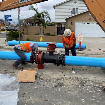 Photo 1: Assembling 12” PVC pipe with 12” valve on Safari Dr.
