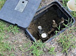 water meter cover open outdoors